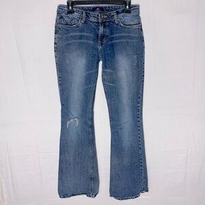 Vintage Warehouse One Med Wash Low Rise Flare Leg Jeans 28